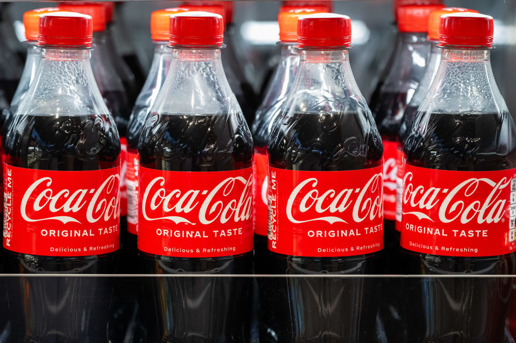 Revenue Cannot Treat Sale Price As Tax Inclusive Without Proof: Gujarat High Court Quashes ₹25.53 Crore Penalty On Coca-Cola Revenue Cannot Treat Sale Price As Tax Inclusive Without Proof: Gujarat High Court Quashes ₹25.53 Crore Penalty On Coca-Cola